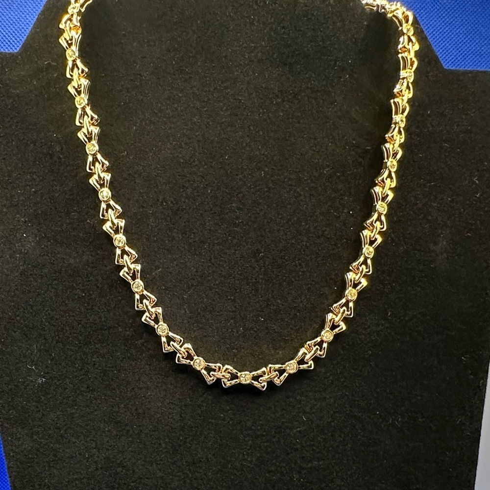 Nina Ricci gold and crystal bow chain necklace